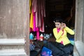 Hanoi, Vietnam - Jun 22, 2017: Actress making up before a traditional operetta in communal house at So village, Quoc Oai district.