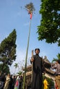 Raising Neu tree rituals in communal house at So village, Quoc Oai district. The bamboo pole placed