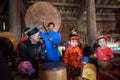 Hanoi, Vietnam - Jun 22, 2017: Vietnamese old traditional folk singer with children learning to play folk instruments in communal