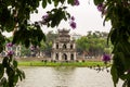 The ancient Turtle Tower in the middle of the Hoan Kiem lake in the city of Hanoi