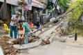 Hanoi, Vietnam - June 14, 2015: Fallen electrical pole damaged on street by natural heavy wind storm in Kim Nguu street Royalty Free Stock Photo