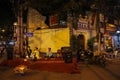 Musicians playing outside an old temple on the streets of the old quarter of Hanoi at night Royalty Free Stock Photo