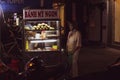 A street food vendor selling Banh My sandwiches at a roadside stall at night in the old quarter of Royalty Free Stock Photo