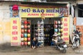 Hanoi, Vietnam - Mar 15, 2015: Exterior facade view of a motorcycle helmet shop in Chua Boc street, Hanoi. Poor quality helmet is