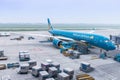 Vietnam Airlines aircraft loading air cargo containers before flight at Noi Bai international airport in Hanoi, Vietnam. Royalty Free Stock Photo