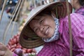 Portrait woman in straw hat on the street food market of old town in Hanoi, Vietnam