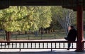 Hanoi, Vietnam, March 30th 2019 : An unidentified man relaxes on a bench