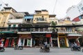 Hanoi, Vietnam - May 2019: street traffic of the city with motorbikers on the foreground