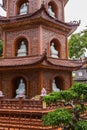 Hanoi, Vietnam - May 28, 2023: The Tran Quoc Pagoda, situated on a small island in Hanoi\'s West Lake, is an ancient Buddhist