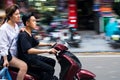 HANOI, VIETNAM - MAY 22, 2017: Vietnamese couple riding on a mot