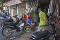 A motorbike repair shop on the street in Hanoi