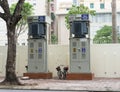 Hanoi, Vietnam - Nov 16, 2014: Electric cabinets on sidewalk of Tran Hung Dao street. Many electric boxes staying on sidewalk are