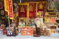 Hanoi, Vietnam - Nov 1, 2015: Worshiping objects for sale on Hanoi street: funeral flag, altar, flower lantern...Offerings in Orie