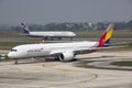 Hanoi vietnam - november2,2017 : asiana airlines plane taxi on noi bai airport in hanoi vietnam