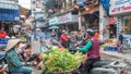 Busy local daily life of the morning street market in Hanoi, Vietnam. A busy crowd of sellers and buyers in the market. Royalty Free Stock Photo