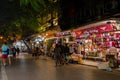 Night life of the street view in Hanoi Old Quarter, people can seen exploring and shopping around Royalty Free Stock Photo