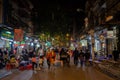 Night life of the street view in Hanoi Old Quarter, people can seen exploring and shopping around Royalty Free Stock Photo