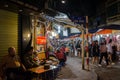 Night street market in Hanoi Old Quarter, people can seen exploring around it. Royalty Free Stock Photo