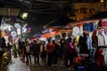 Night street market in Hanoi Old Quarter, people can seen exploring around it. Royalty Free Stock Photo