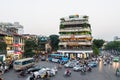 View of busy traffic in an intersection with many motorbikes and vehicles in Hanoi, capital of Vietnam. Royalty Free Stock Photo