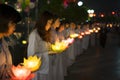 Hanoi, Vietnam - Oct 10, 2014: Buddhists hold flower garlands and colored lanterns for celebrating Buddha`s birthday organised at Royalty Free Stock Photo