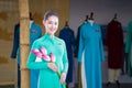 Hanoi, Vietnam - Oct 15, 2016:Closeup Vietnam Airlines air hostess mannequin wearing uniform at Ao Dai festival on Hoang Dieu stre