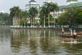 Hanoi, Vietnam - Oct 2, 2016: Garbage collector, environment workers take mass dead fishes out from West Lake Royalty Free Stock Photo