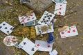 Hanoi, Vietnam - Oct 25, 2015: Old playing cards on a pile of garbage on street