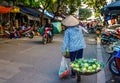 Local vendors selling food at Old Quarter morning market in Hanoi Royalty Free Stock Photo