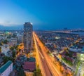 Hanoi, Vietnam - Sep 19, 2015: Aerial skyline view of Nguyen Khoai street with Vinh Tuy bridge crossing Red River on background. H Royalty Free Stock Photo