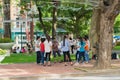 Hanoi, Vietnam - Sep 3, 2015: Group of students learning outdoor at park in Hanoi