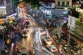 Hanoi, Vietnam : Sep 09 2017 : Pedestrians on road with traffic jam in old quarter town in rainy