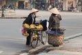 Hanoi Vietnam 20/12/2013 street sellers with bicycle with flowers and fruit