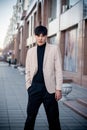 Handsome eastern man in suit, fashion, street style. Royalty Free Stock Photo