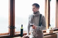 Hansome man enjoying a glass of red wine Royalty Free Stock Photo