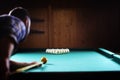 Hansome man playing billiards alone Royalty Free Stock Photo