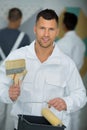 hansome man holding brush Royalty Free Stock Photo