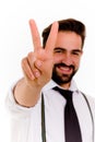 Hansome stylish brunette man showing victory with fingers.