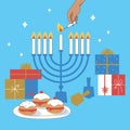 Hanukkah blue background with wooden dreidels, donuts, gift boxes and menorah. Happy Hanukkah, Jewish