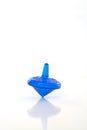 Hanukkah blue dreidel spinning Royalty Free Stock Photo