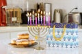 Hanukkah celebration judaism tradition family religious holiday symbols lighting candles on a hanukkiah menorah during Royalty Free Stock Photo