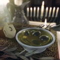 Hanukkah close up with candles, old books, spinning top Royalty Free Stock Photo
