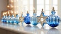 Hanukkah Delights: Vibrant Ornaments on Reflective Marble Royalty Free Stock Photo