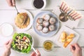 Hanukkah dinner with traditional dishes horizontal