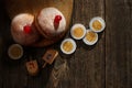 Hanukkah donutsand traditional spinning dreidel on a wooden board. Close up