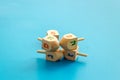 Hanukkah dreidels on blue table. Jewish holideys concept. Close up, space for text Royalty Free Stock Photo