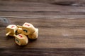 Hanukkah dreidels on wooden table. Jewish holideys concept. Close up, space for text Royalty Free Stock Photo