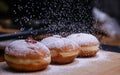 Hanukkah food doughnuts with jelly and sugar powder with bookeh background. Jewish holiday Hanukkah concept and background