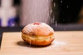 Hanukkah food doughnuts with jelly and sugar powder with bookeh background. Jewish holiday Hanukkah concept and background