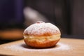 Hanukkah food doughnuts with jelly and sugar powder with bookeh background. Jewish holiday Hanukkah concept and background.